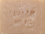 close up of a tan bar of soap