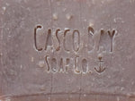 close up of a tan bar of soap