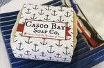 soap bar wrapped in a label with anchors on it