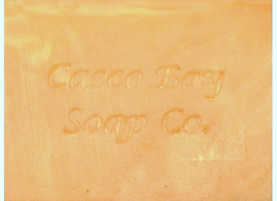 close up of a tan bar of soap