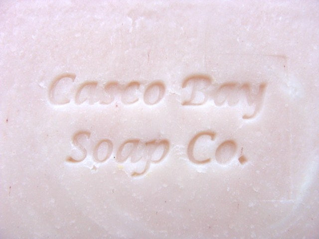 close up of a pink bar of soap