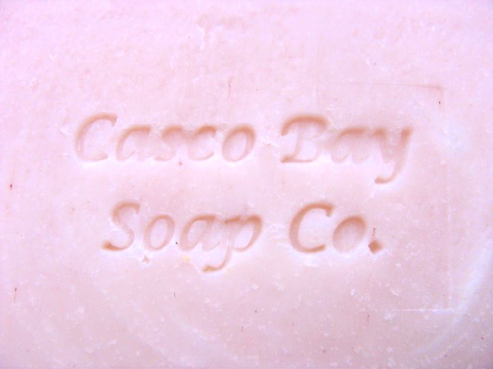 close up of a pink bar of soap